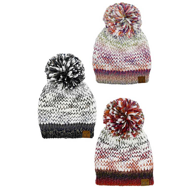 C.C Multi Color Yarn Pom Pom Beanie Hat, is a great choice for the winter season. It's made of a soft, multi-colored yarn that is sure to keep you warm and toasty. The stylish pom pom detail on the top adds a touch of flair to this classic cold-weather accessory. This beanie hat is a great winter gift idea.