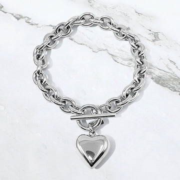 Madeline Love Rhodium Stainless Steel Puffy Heart Charm Toggle Bracelet - Bracelets