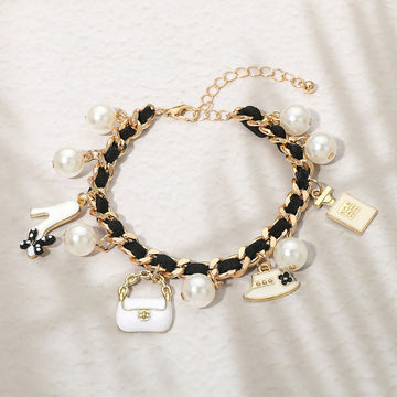 Madeline Love Black, Cream, Gold Fashion Pearl Charm Station Bracelet - Bracelets