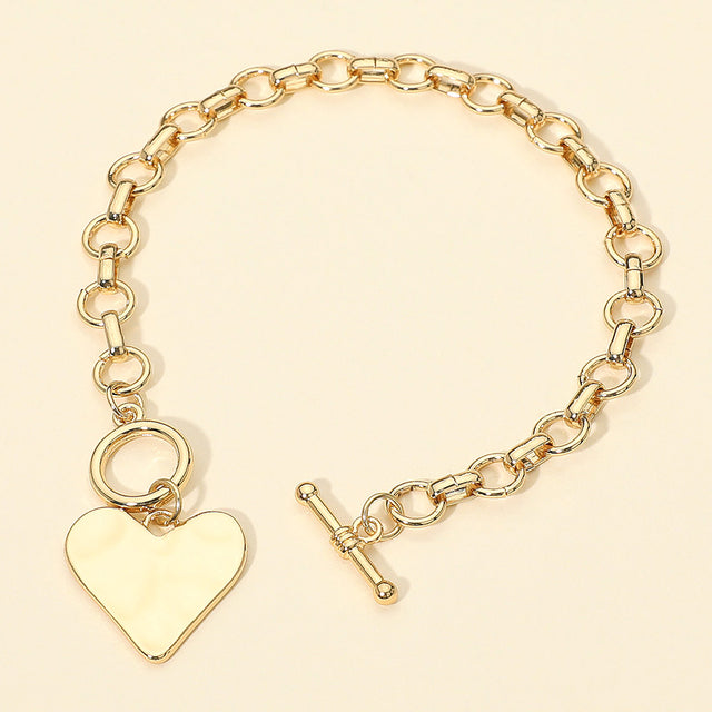 Madeline Love Gold Hammered Metal Heart Charm Chain Link Toggle Bracelet