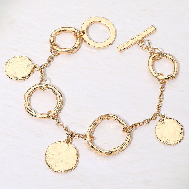 Madeline Love Gold Hammered Metal Disc Charm Ring Link Bracelet