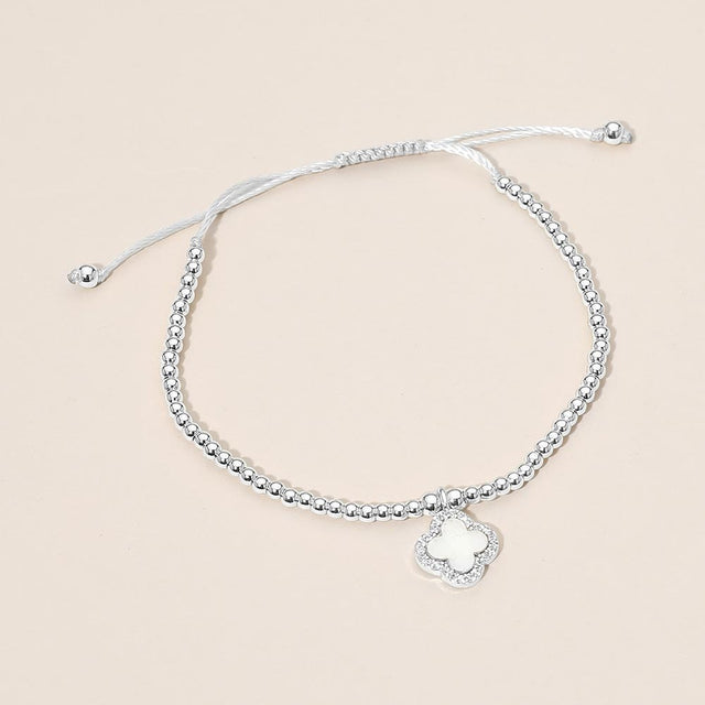 Madeline Love Cream, Rhodium CZ Rim Mother of Pearl Quatrefoil Charm Beaded Adjustable Cinch Pull Tie Bracelet - Bracelets