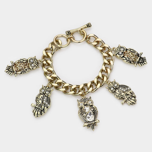 Madeline Love Clear, Gold Burnished Multi Owl Charm Toggle Bracelet - Bracelets