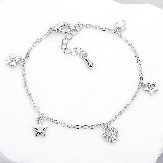 Madeline Love Clear, Silver Stone Paved Clover Heart Star Charm Station Bracelet - Bracelets