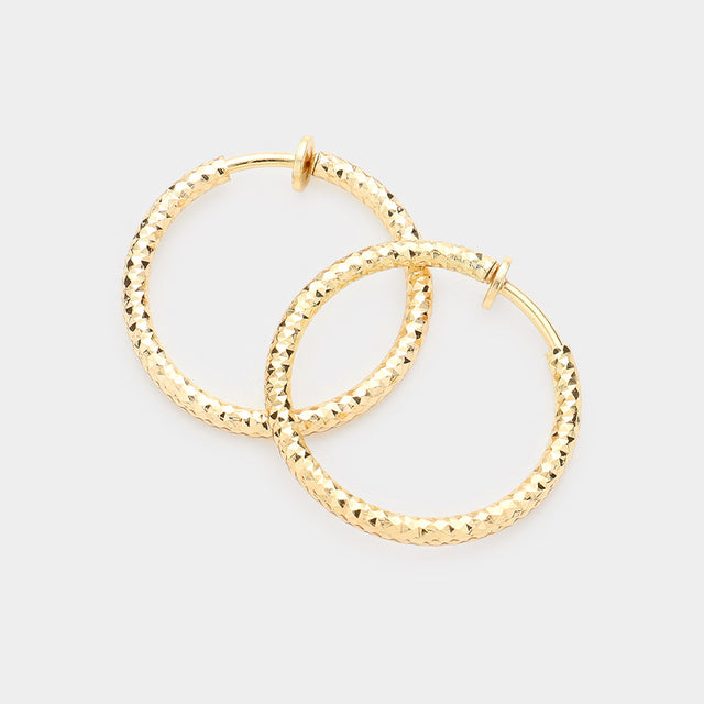 Madeline Love Gold 1.25" Textured Metal Hoop Clip on Earrings