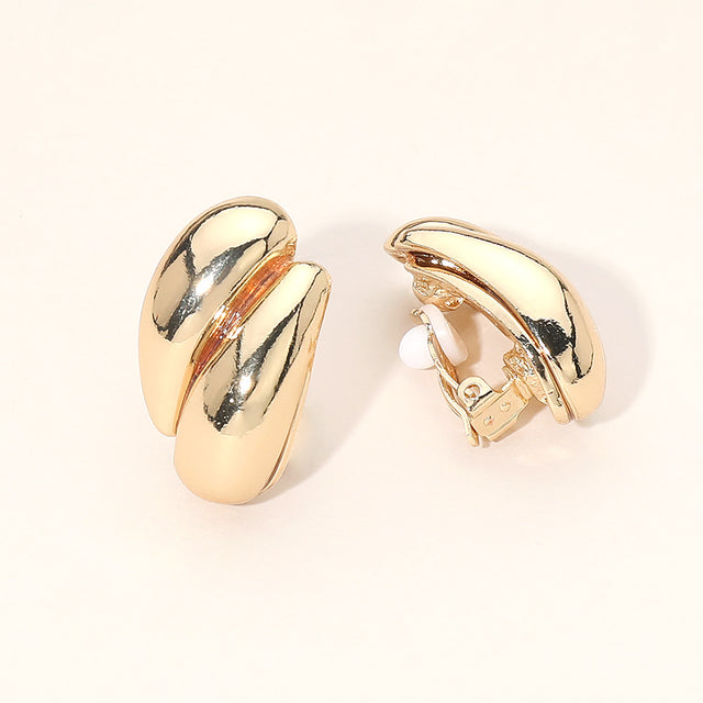 Madeline Love Gold Sculpted Curved Metal Clip On Earrings