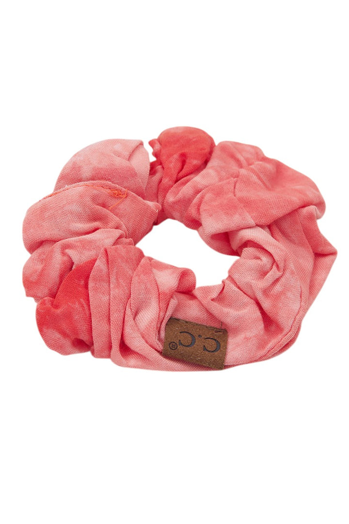 Coral C.C Tie Dye Scrunchies - the perfect accessory to add a pop of color to any outfit! Made with high-quality materials, these scrunchies are durable and stylish. With vibrant tie-dye designs, they are a must-have for any fashionista. Express your unique style and elevate your hair game with C.C Tie Dye Scrunchies.