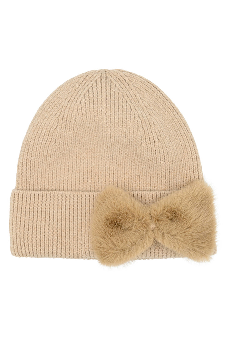 Camel C.C Faux Fur Solid Bow Beanie Winter Hat merges thermal protection with refined aesthetics. Crafted with premium faux fur for exceptional insulation, this headwear features a distinctive bow accent that elevates its design profile. Engineered for consistent warmth retention while maintaining breathability, it represents the optimal balance of functional performance 