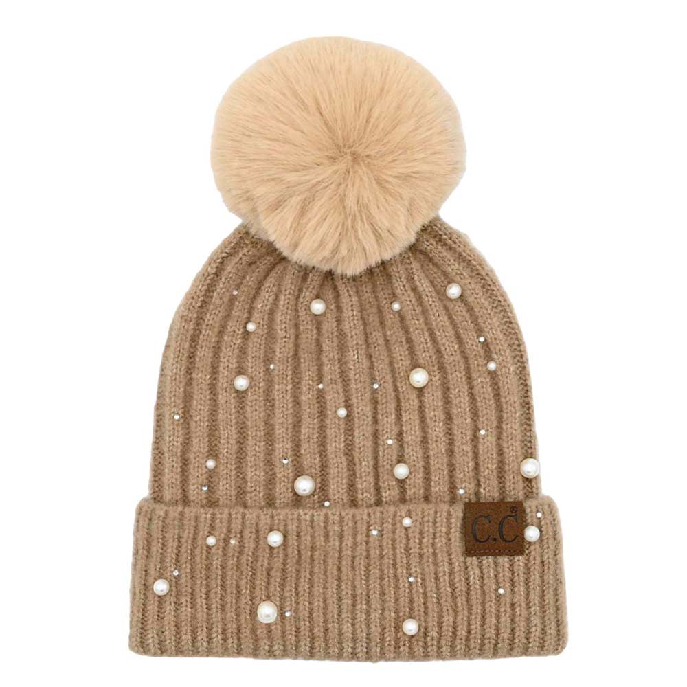 Camel C.C Pearl Embellishments Pom Pom Beanie Hat, this stylish beanie is made from high-quality material for a comfortable and snug fit. Featuring pearl embellishments and a pom pom detail, this hat is sure to keep you looking stylish and chic in chilly weather. Perfect winter gift for friends and family.