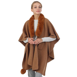 Camel Faux Fur Collar Pom Pom Poncho, with the latest trend in ladies' outfit cover-up! The high-quality knit poncho is soft, comfortable, and warm but lightweight. It's perfect for your daily, casual, party, evening, vacation, and other special events outfits. A fantastic gift for your friends or family.