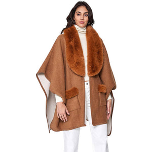 Camel Faux Fur Trimmed Front Pockets Ruana Poncho, Elevate your winter style. Crafted with faux fur accents and featuring convenient front pockets, it adds warmth, texture, and a touch of elegance to any outfit. Awesome gift choice for your family members, friends, fashion-loving young adults, colleagues, or yourself.