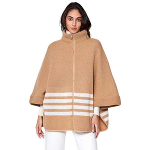 Camel Sporty Bordered Zip Up Knit Cape Poncho, Crafted with a cozy acrylic-blend fabric, it features a zip-up front and generous hood for extra protection against the cold. The bold, bordered design adds a classic touch, making it the perfect piece for outdoor activities. A Perfect winter gift for any occasion