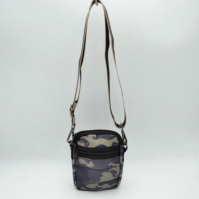 Camo Step up your hands-free game with the Camouflage Puffer Crossbody Bag. Fusing tactical utility with lightweight street style, this compact companion is engineered for those who need their essentials close by during travel, festivals, outdoor adventures, or daily commutes.