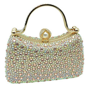 Champaign Crystal Diamond Top Handle Embellished Evening Clutch Bag is a remarkable evening bag, crafted from premium materials with a crystal diamond top handle for a special touch. Featuring a soft-textured fabric lining and a stylish, elegant exterior, this clutch bag is ideal for special occasions. 