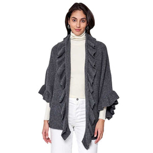 Charcoal Ruffle Knit Cardigan, Featuring a unique ruffle detailing and crafted from soft knit fabric, this cardigan offers both comfort and style. Perfect for layering with your winter wardrobe, you'll feel comfortable and fashionable in any situation. Ideal winter gift to fashion forwarded friends and family members.