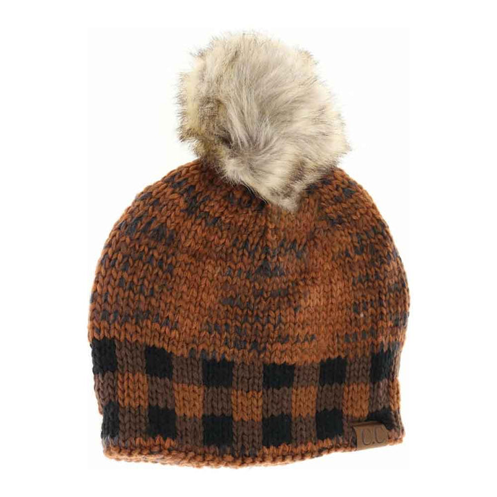 Cinnamon Buffalo Check Mixed Print Fur Pom C.C Beanie combines timeless style with modern detail for superior winter wear. Crafted with a mix of classic buffalo check and complementary prints, this beanie offers visual depth and versatility. The plush faux fur pom adds both warmth and a refined finishing touch. Made with a soft, stretchable knit, it ensures a snug, comfortable fit that effectively shields against chilly conditions. Ideal for those seeking a blend of traditional patterns and contemporary com