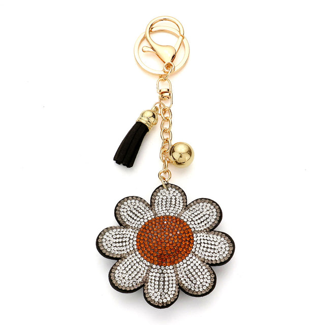 Clear Bling Daisy Flower Tassel Bag Charm is a beautiful and stylish accessory for your bag. With its sparkling daisy flower design and trendy tassel, it will add a touch of glamour to any bag. Perfect for any fashion-forward individual looking to elevate their style. 