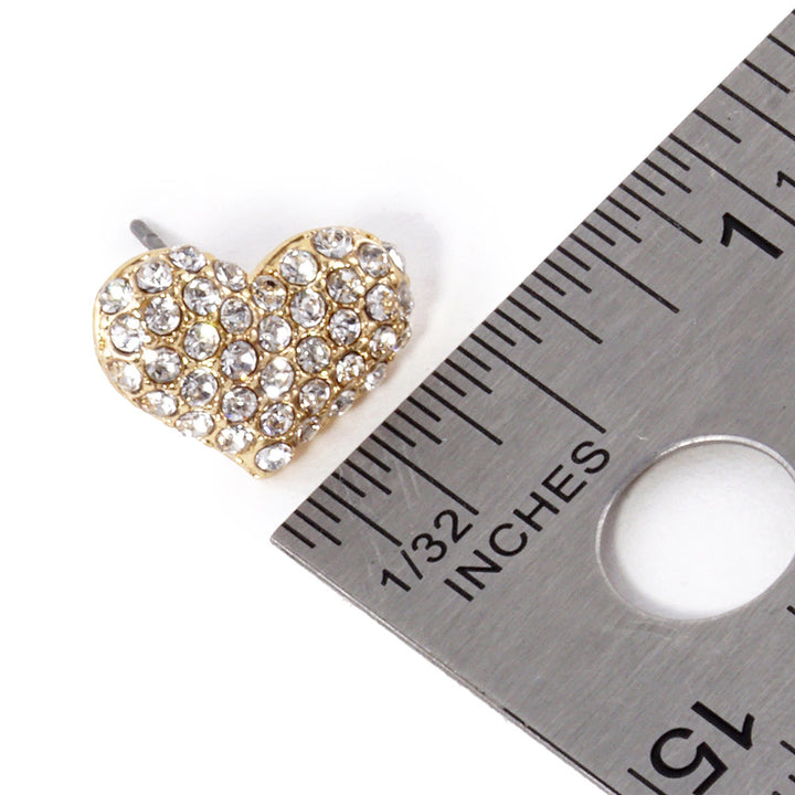 Clear-Gold-Crystal Pave Heart Stud Earrings are expertly crafted with sparkling crystals, adding a touch of elegance to any outfit. Made with precision and attention to detail, they are perfect for special occasions or everyday wear. Upgrade your style with these stunning earrings.