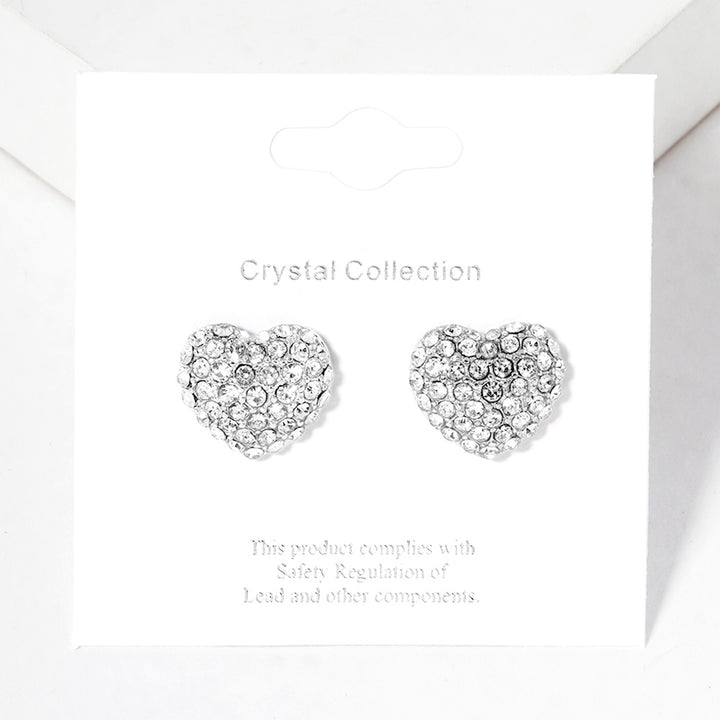 Clear Rhodium Crystal Pave Heart Stud Earrings bring a stylish and sophisticated touch to any outfit. Featuring a sparkling crystal pave design, these earrings add elegance to your look. Crafted with high-quality materials, they are perfect for any occasion. 