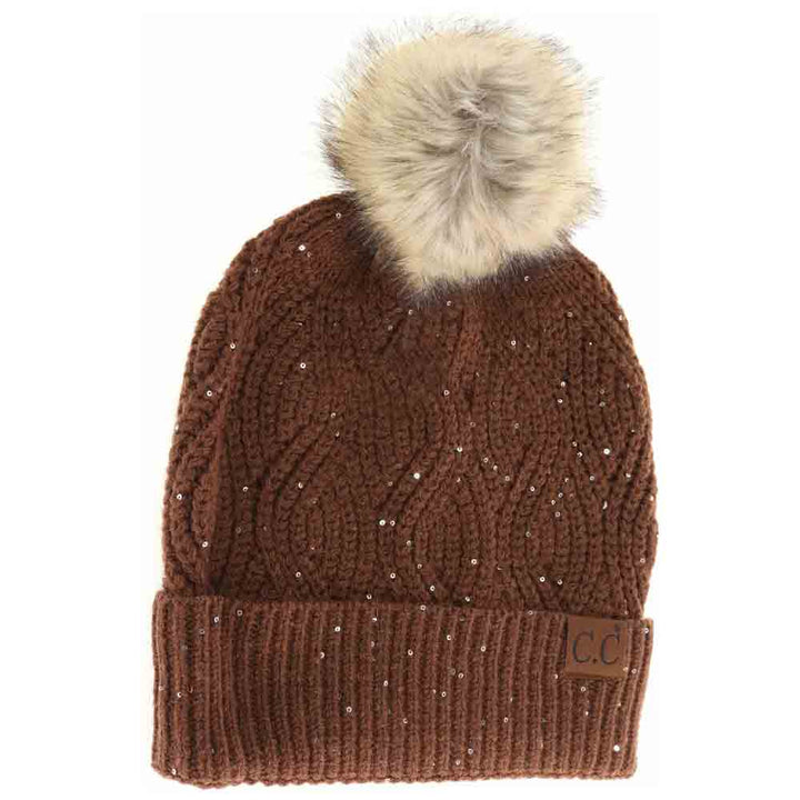 Coffee Sequin Brioche Cable Knit Fur Pom C.C Beanie combines classic craftsmanship with a modern touch. Featuring a soft brioche cable knit pattern enhanced by subtle sequins, this beanie adds understated sparkle to cold-weather style. The plush fur pom enhances warmth and a refined aesthetic, making it an ideal accessory for both functionality and fashion during chilly days. Durable and comfortable, it delivers expert-level design that complements any winter wardrobe. 