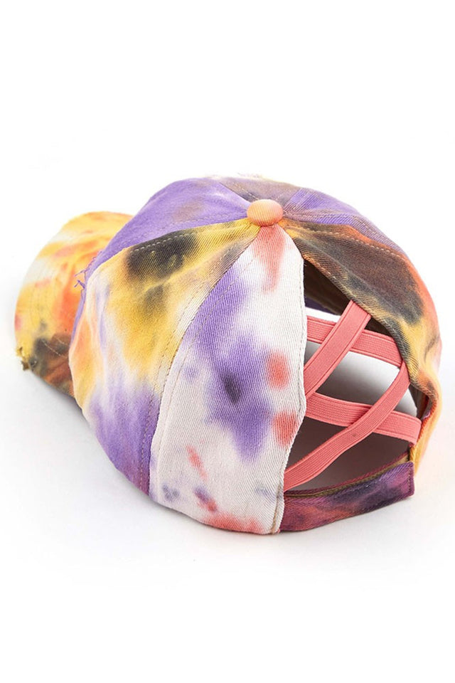 Coral C.C TIE DYE BASEBALL PONYCAP is a stylish addition to any outfit. Made with high-quality materials and a unique tie-dye design, it not only looks great but also offers protection from the sun. The adjustable ponytail hole allows for comfortable wear. Upgrade your style game with this must-have accessory.