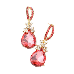 Coral Teardrop Crystal Rhinestone Evening Earrings, are the perfect accessory for any special occasion. Each earring features a teardrop-shaped crystal encrusted in rhinestones for a glamorous sparkle and shine. High-quality stones are set securely in the design. A timeless gift piece that will sparkle for years.