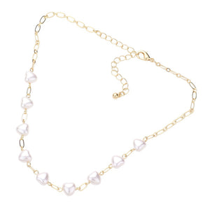 Cream Heart Pearl Link Choker Necklace, is crafted with the utmost attention to detail and quality. It features a unique link design and a stunning heart-shaped pearl, perfect for special occasions or gifting. Its classic design makes it a timeless addition to any collection.