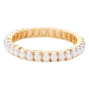 Cream Oval Stone Cluster Stretch Evening Bracelet, an exquisite piece of jewelry with beautiful oval-shaped stones arranged in a cluster. Crafted with a stretchable elastic band, this bracelet provides a comfortable fit for any size wrist. A stunning accessory for a special occasion. Perfect gift choice for someone you love.