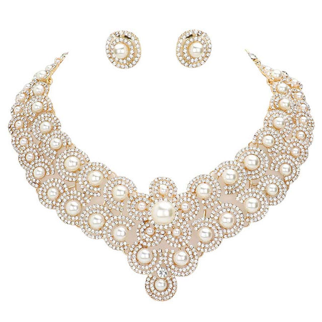 Cream Pearl Accented Evening Necklace, Get ready with these pearl necklaces and put on a pop of shine to complete your ensemble. Wear these pearl embellished evening necklaces to show your unique yet attractive & beautiful choice. The elegance of this pearl-accented necklace goes unmatched, great for wearing at a party! These classy necklaces are perfect for parties, Weddings, and Evenings. Awesome gift for birthdays, anniversaries, Valentine‚Äö√Ñ√¥s Day, or any special occasion.