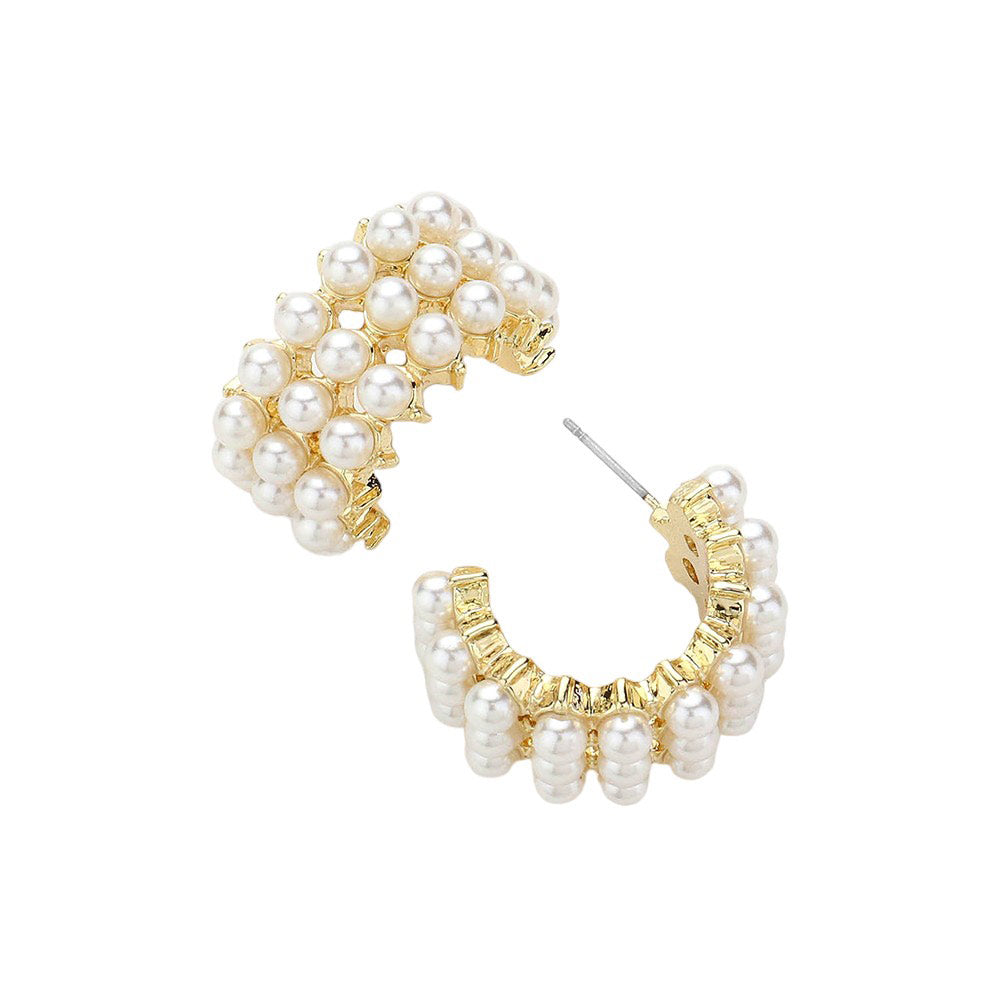 Cream Pearl Cluster Hoop Earrings, Embrace elegance with these. These stunning earrings feature a delicate cluster of lustrous pearls, adding a touch of sophistication to any outfit. Elevate your style with these luxurious earrings and make a statement wherever you go.
