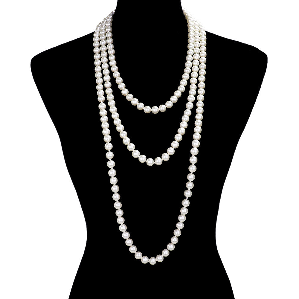 Cream Pearl Long Necklace, is the perfect marriage between timeless elegance and modern style. Handcrafted with pearls, this exquisite necklace is sure to become a staple in any jewelry wardrobe. Its contemporary design and luxurious materials make it a perfect choice for any occasion. Perfect occasional gift idea.