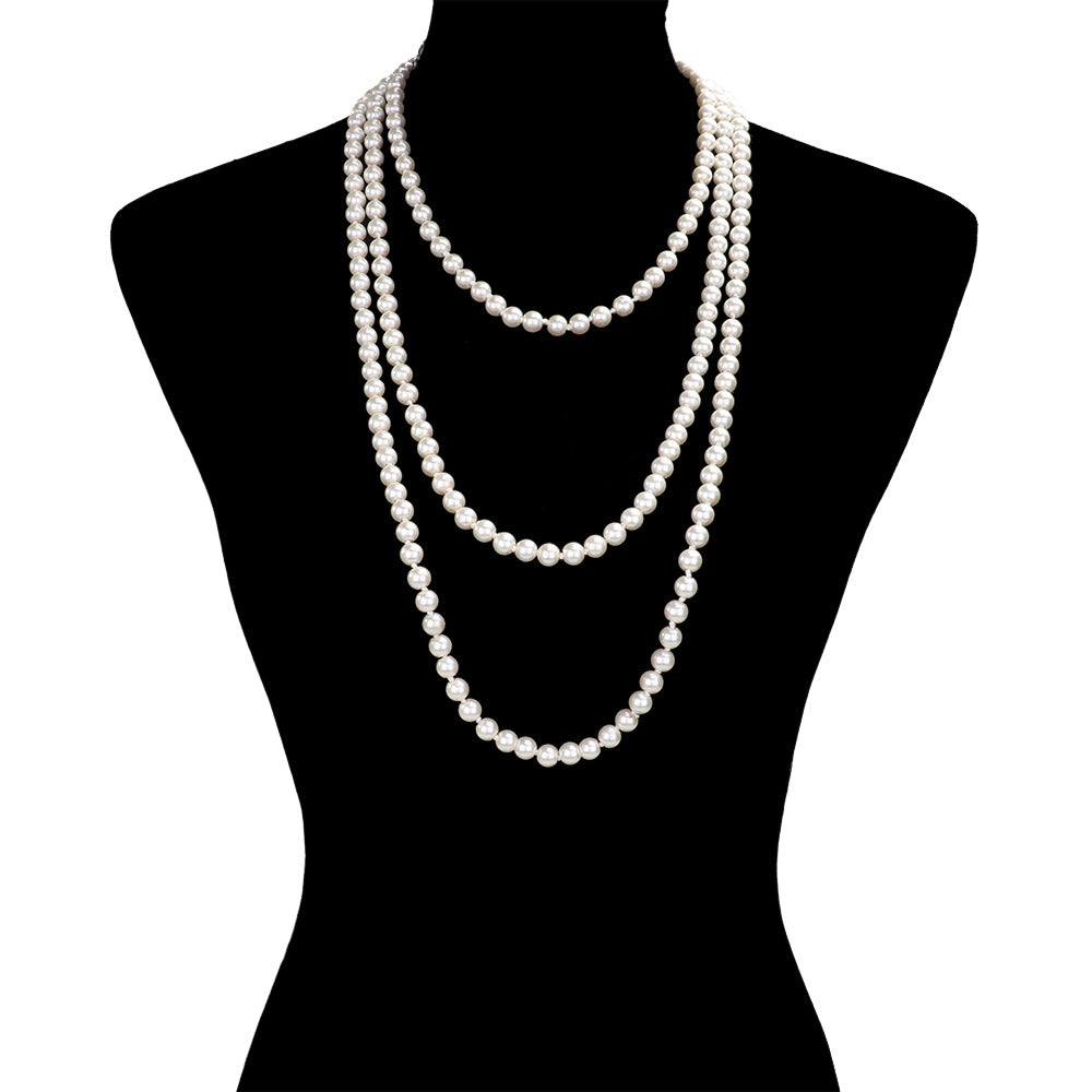 Cream Pearl Long Necklace, is the perfect marriage between timeless elegance and modern style. Handcrafted with pearls, this exquisite necklace is sure to become a staple in any jewelry wardrobe. Its contemporary design and luxurious materials make it a perfect choice for any occasion. Perfect occasional gift idea.]