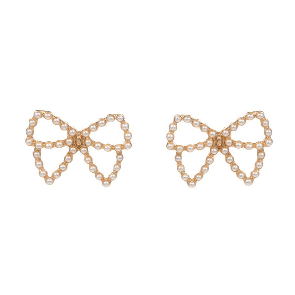 Cream Pearl Paved Bow Stud Earrings, Elevate your accessories with our exquisite earrings. With expertly paved pearls encircling a delicate bow design, these earrings add a touch of sophistication to any outfit. Perfect for any occasion, our earrings boast a timeless elegance that will never go out of style.