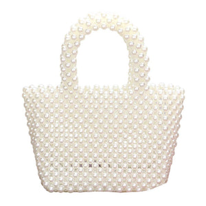 Cream Pearl Tote Bag, is perfect for any fashionista looking for an elegant way to store your belongings. This bag is made for protection and comfort. With enough space for everyday essentials, this tote offers a practical yet fashionable way to accessorize your look. Ideal gift choice on any occasion for the people you love
