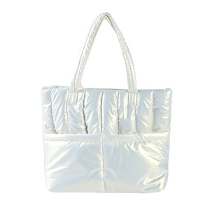 Cream Solid Puffer Tote Shoulder Bag, is an impressive combination of fashion and practicality. Made of durable material, this shoulder bag offers superior protection from impacts with its padded construction, and also features a shoulder strap for added convenience. Give one of these bags as a gift to your favorite ones.