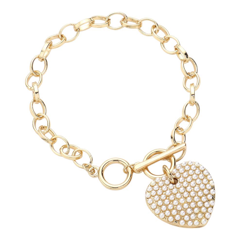Cream Stone Paved Heart Pendant Metal Toggle Bracelet, is a must-have accessory for any fashion-forward individual. Exquisitely crafted to elevate any outfit, this bracelet is a unique addition to your jewelry collection. Its toggle closure ensures a secure fit and its elegant style will make you stand out from the crowd.