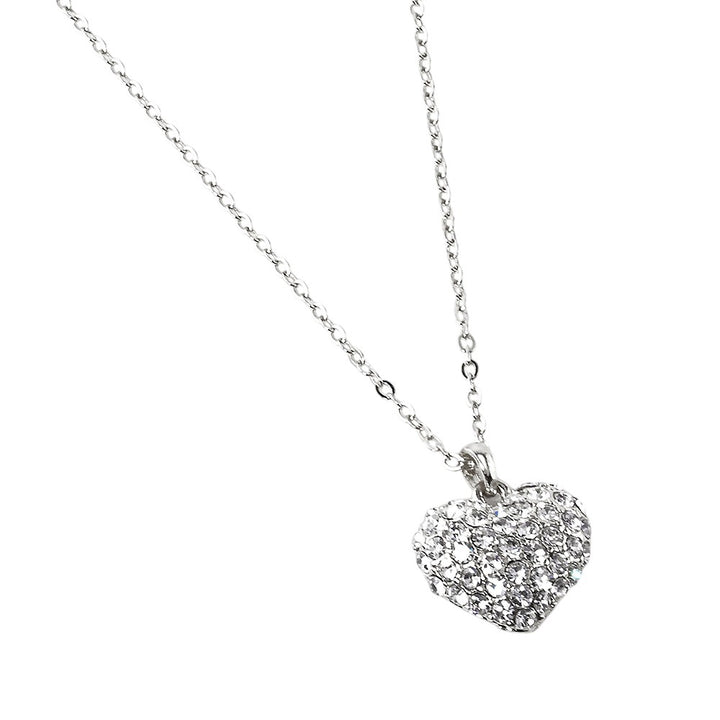 Crystal Pave Heart Pendant Necklace is crafted to bring a touch of sophistication to any outfit. Its sparkling pave crystals are timeless and elegant, while the heart-shaped pendant symbolizes love and affection. Made from high-quality materials, this necklace is designed to make a statement and elevate your style effortlessly. 