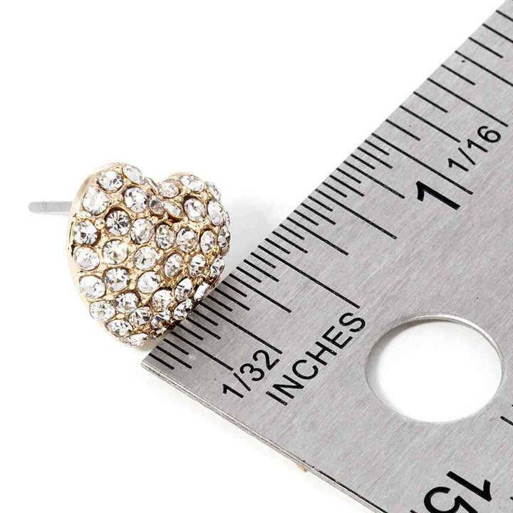 Crystal Pave Heart Stud Earrings bring a stylish and sophisticated touch to any outfit. Featuring a sparkling crystal pave design, these earrings add elegance to your look. Crafted with high-quality materials, they are perfect for any occasion. 