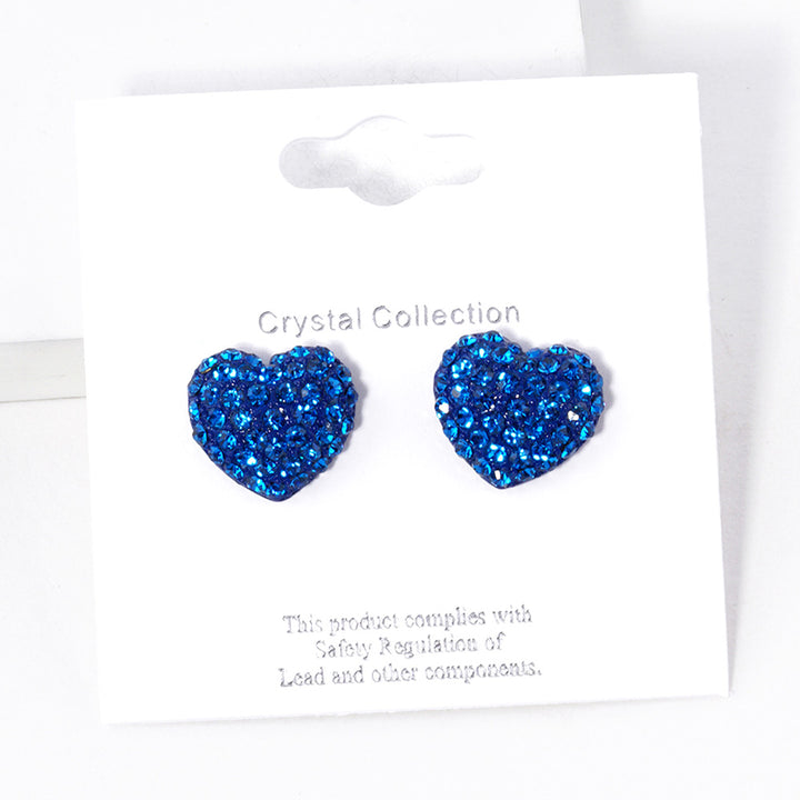 Crystal Pave Heart Stud Earrings bring a stylish and sophisticated touch to any outfit. Featuring a sparkling crystal pave design, these earrings add elegance to your look. Crafted with high-quality materials, they are perfect for any occasion. 