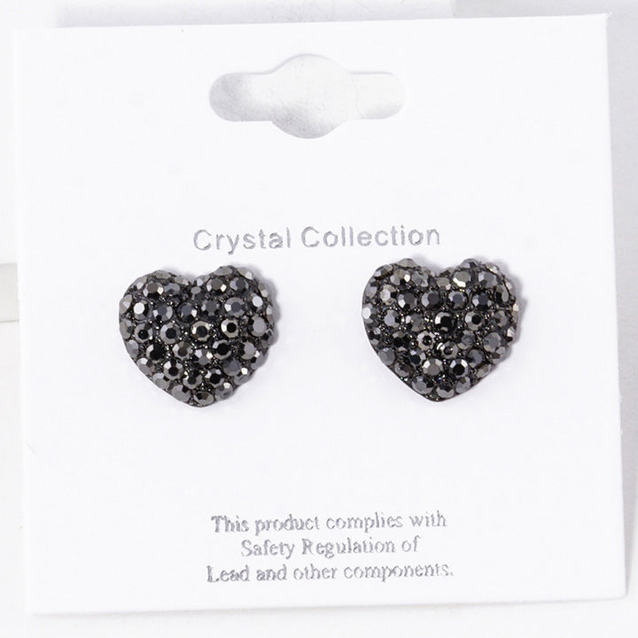 Crystal Pave Heart Stud Earrings bring a stylish and sophisticated touch to any outfit. Featuring a sparkling crystal pave design, these earrings add elegance to your look. Crafted with high-quality materials, they are perfect for any occasion. 