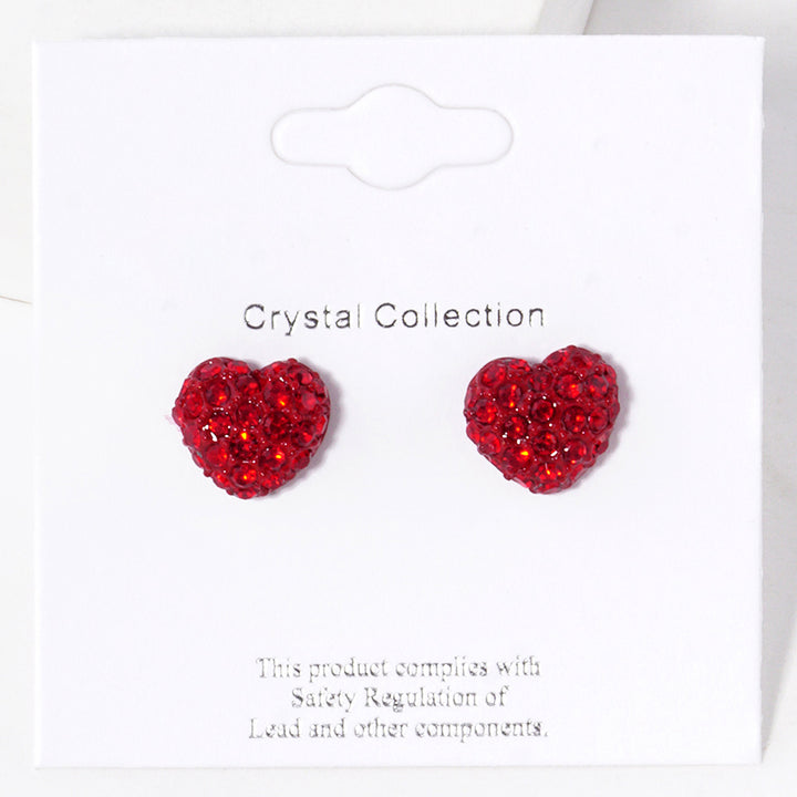 Crystal Paved Heart Stud Earrings bring elegance and sparkle to any outfit. Crafted with high-quality crystals, they are perfect for dressing up or adding a hint of glamour. The delicate heart design is a timeless classic that never goes out of style. 