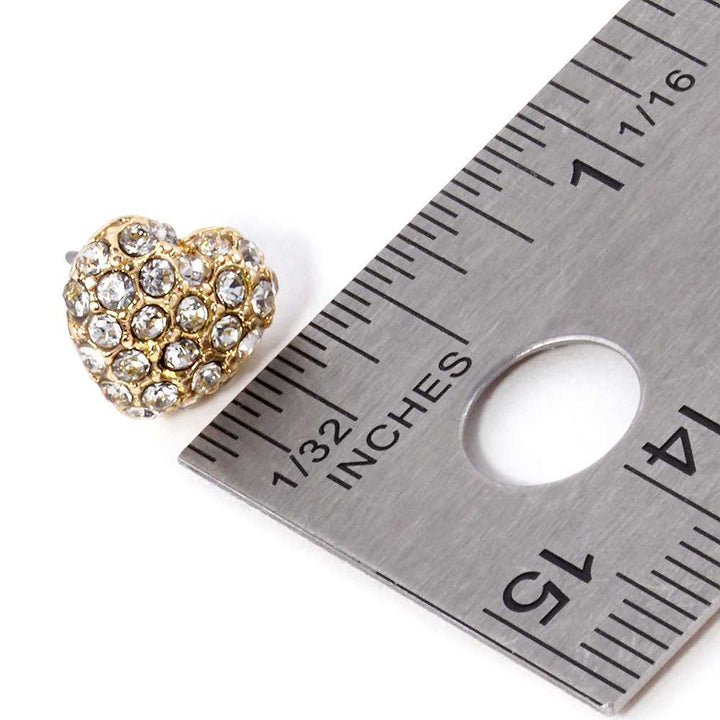 Crystal Paved Heart Stud Earrings bring elegance and sparkle to any outfit. Crafted with high-quality crystals, they are perfect for dressing up or adding a hint of glamour. The delicate heart design is a timeless classic that never goes out of style. 