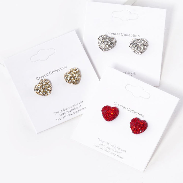 Crystal Paved Heart Stud Earrings bring elegance and sparkle to any outfit. Crafted with high-quality crystals, they are perfect for dressing up or adding a hint of glamour. The delicate heart design is a timeless classic that never goes out of style. 