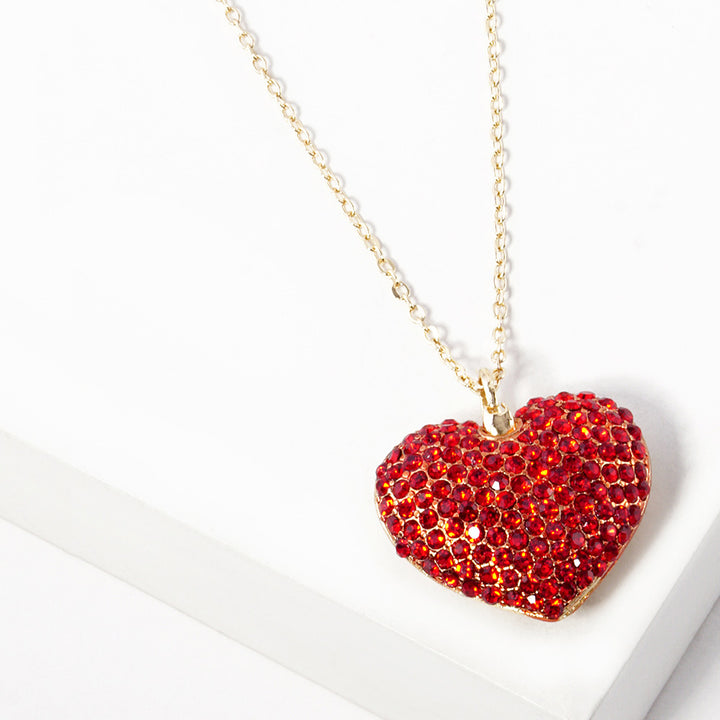 Crystal Rhinestone Pave Heart Pendant Necklace boasts a dazzling display of crystals, meticulously placed to create a stunning heart shape. With its elegant design and meticulous craftsmanship, this necklace is the perfect accessory to add a touch of sparkle to any outfit. 