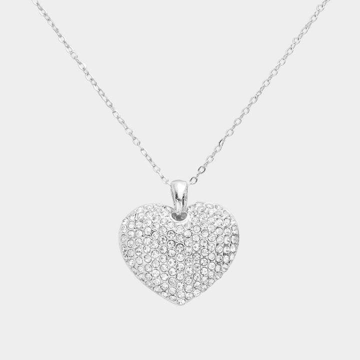 Crystal Rhinestone Pave Heart Pendant Necklace boasts a dazzling display of crystals, meticulously placed to create a stunning heart shape. With its elegant design and meticulous craftsmanship, this necklace is the perfect accessory to add a touch of sparkle to any outfit. 