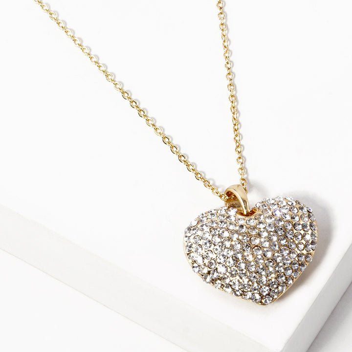 Crystal Rhinestone Pave Heart Pendant Necklace boasts a dazzling display of crystals, meticulously placed to create a stunning heart shape. With its elegant design and meticulous craftsmanship, this necklace is the perfect accessory to add a touch of sparkle to any outfit. 