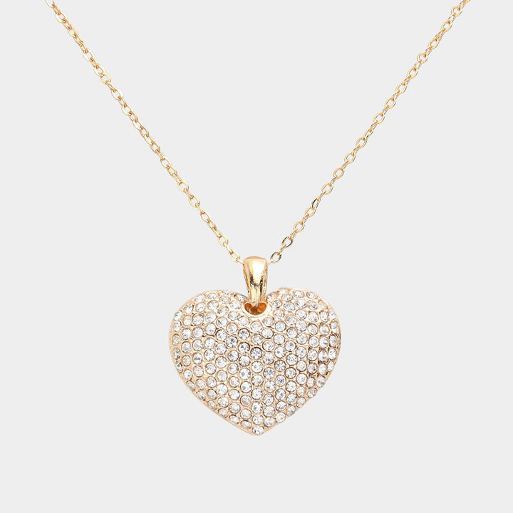 Crystal Rhinestone Pave Heart Pendant Necklace boasts a dazzling display of crystals, meticulously placed to create a stunning heart shape. With its elegant design and meticulous craftsmanship, this necklace is the perfect accessory to add a touch of sparkle to any outfit. 