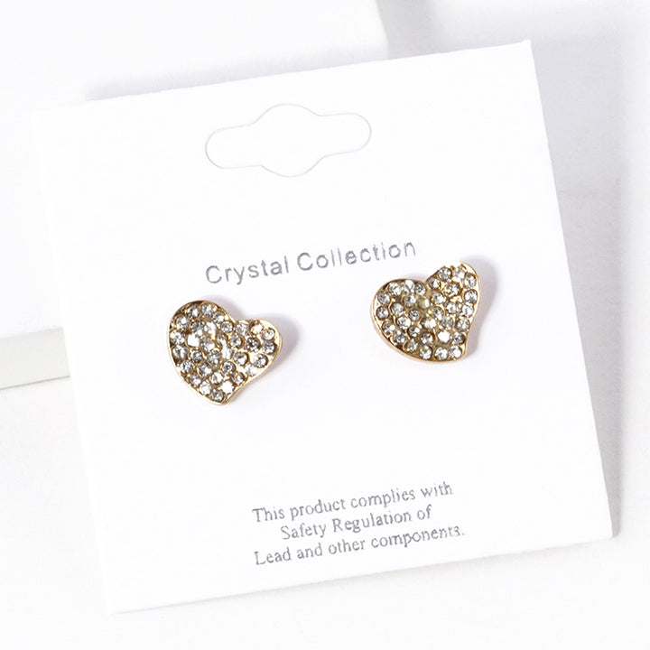 Crystal Rhinestone Paved Heart Stud Earrings bring a touch of elegance to any outfit. Crafted with sparkling crystals, they offer exceptional quality and timeless charm. Perfect for any occasion, these stunning earrings elevate your style effortlessly. 