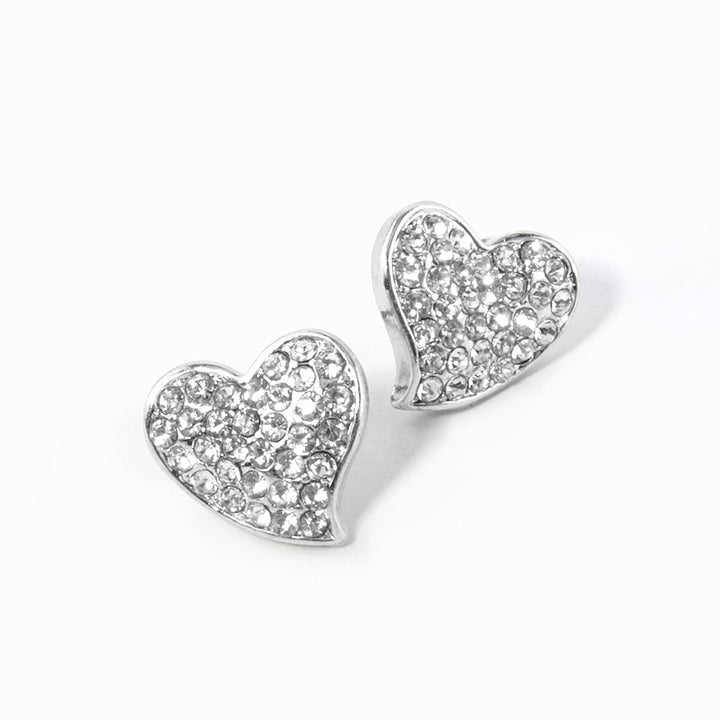 Crystal Rhinestone Paved Heart Stud Earrings bring a touch of elegance to any outfit. The sparkling rhinestones are intricately arranged in a heart-shaped design, adding a romantic and sophisticated charm to your look. Perfect for any occasion, these earrings are a must-have addition to any jewelry collection. 