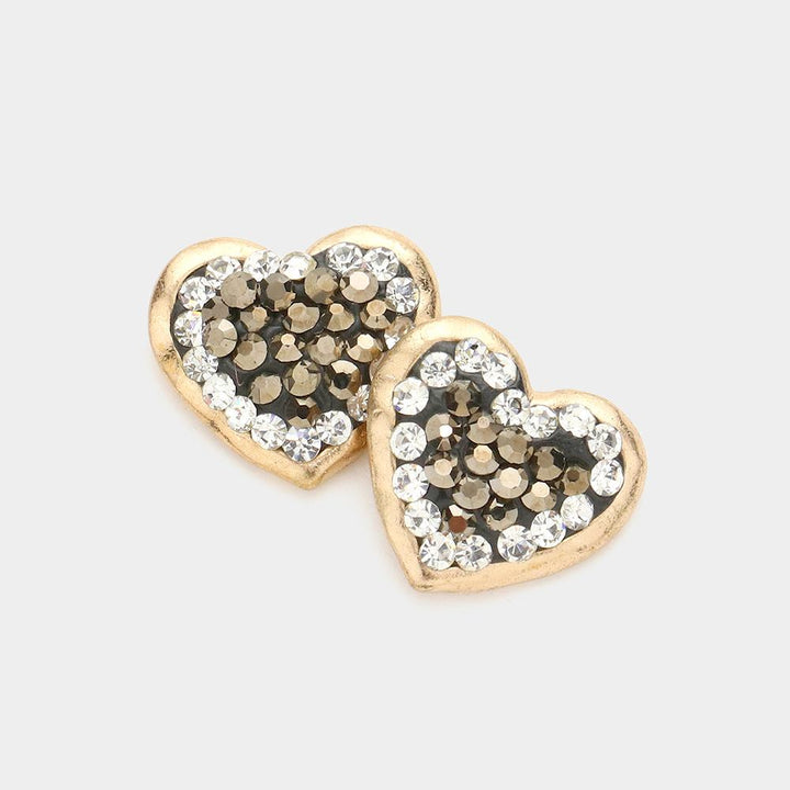 Crystal Pave Heart Stud Earrings showcase the perfect balance of sophistication and sparkle. Featuring a stunning pave design, these earrings offer a timeless look that enhances any outfit. Made from high-quality materials, they are the ultimate addition to any jewelry collection.